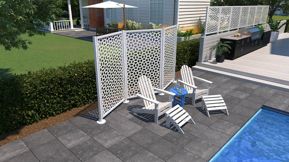 Trex Privacy freestanding and attached panels providing privacy to a pool and a grill.