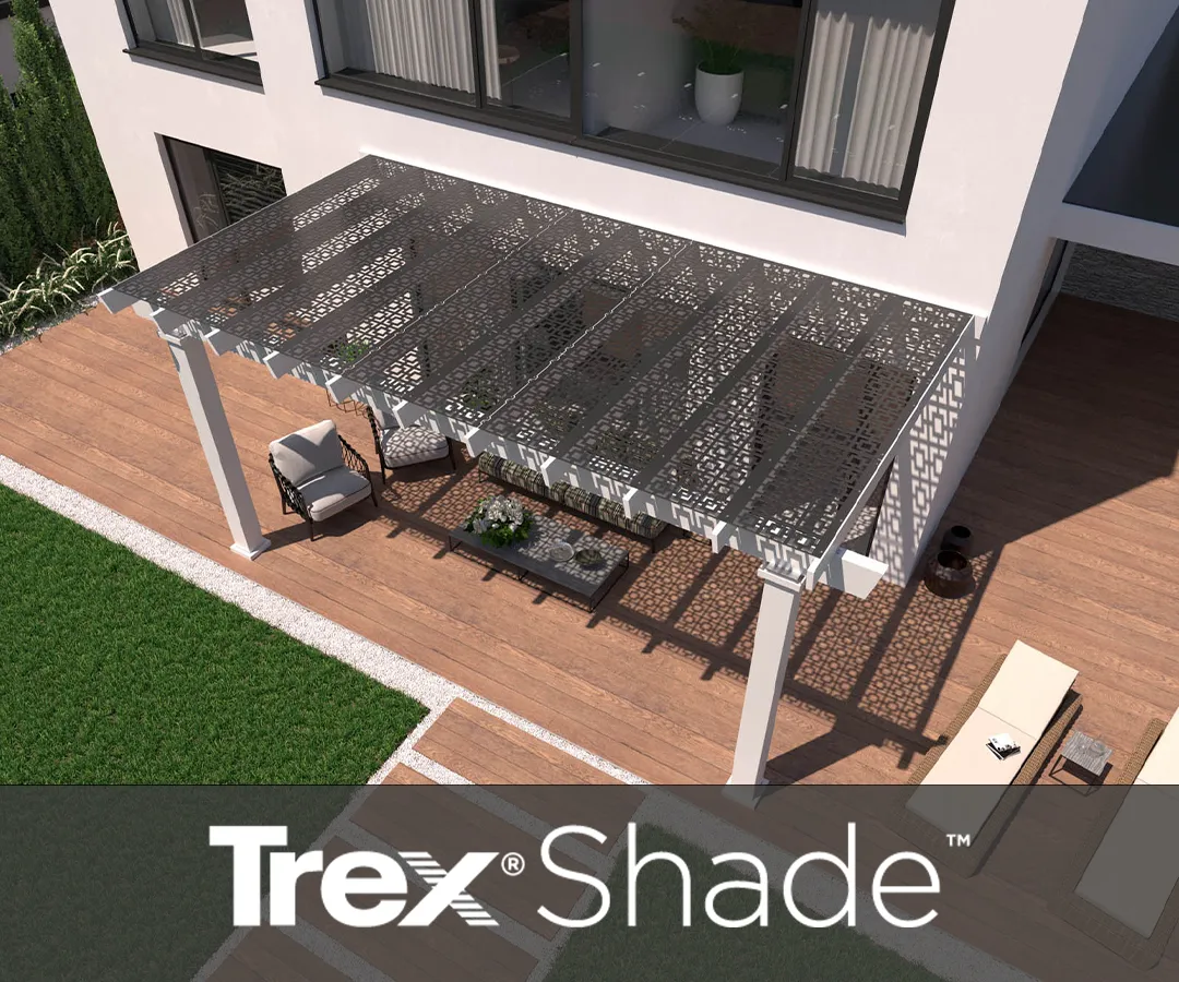 Outdoor decorative screen panels shading an outdoor lounge area with the Trex Shade logo.
